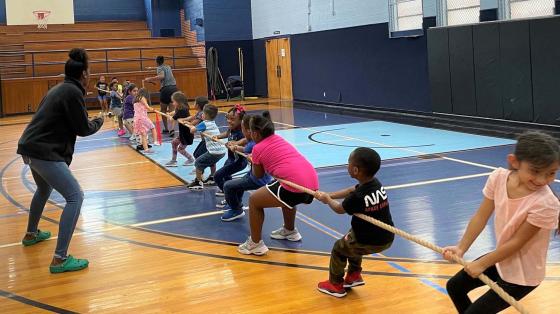 campers in a tug-of-war