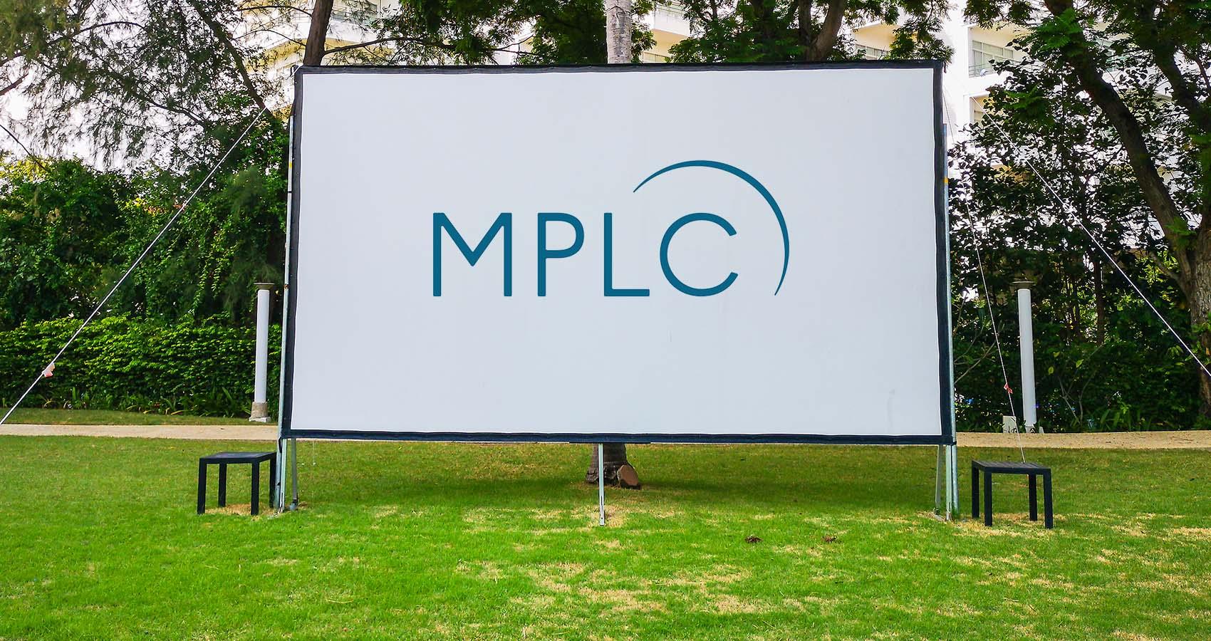 Outdoor movie screen with licensing logo