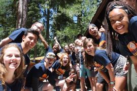 group of camp staff smiling at camera