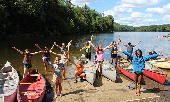 campers with canoes