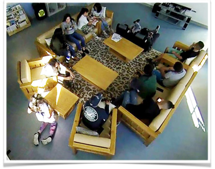 overhead photo of people sitting on furniture