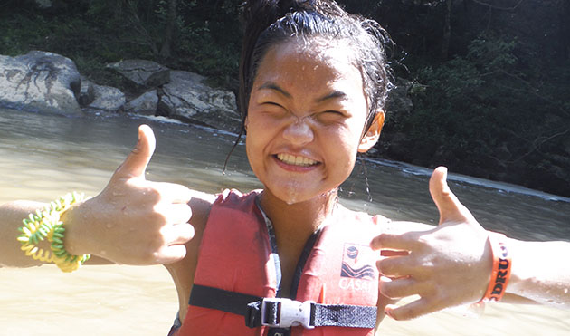 Camper giving thumbs up