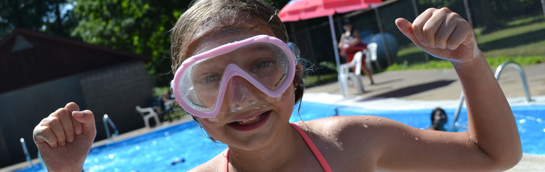 Camper with swim goggles
