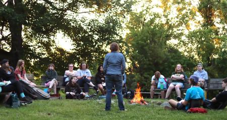 campers around fire