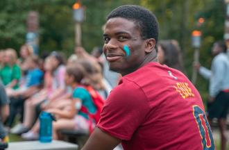 camp staff member with face paint