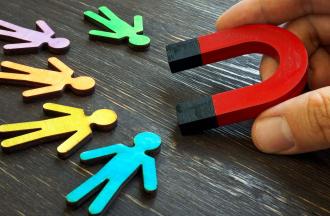 magnet attracting cut outs of people