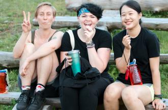 camp staff sitting together