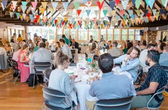 groups at circular tables indoors