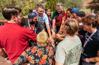 camp staff in huddle