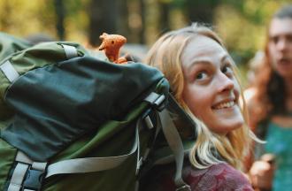 staff with backpack