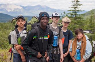 boys hiking in mountains