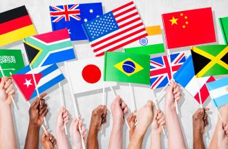 stock photo of hands holding flags from different countries