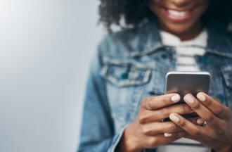 person reading a text on phone