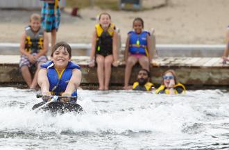 camper kneeboarding