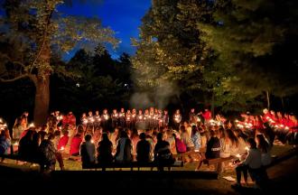 people around a campfire