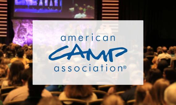 ACA Logo with audience in background
