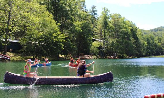campers canoeing