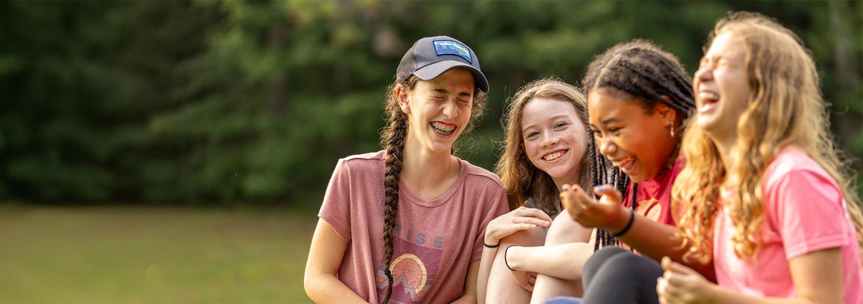 Group of campers sharing a laugh together