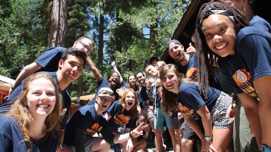 group of camp staff smiling at camera