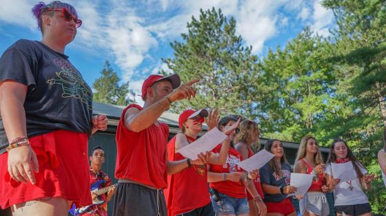 Staff speaking to campers