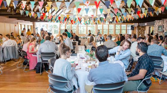 groups at circular tables indoors