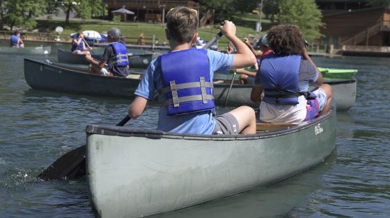 campers canoeing