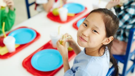 girl eating sandwich