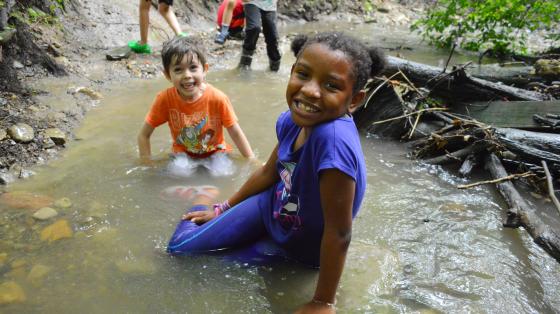 campers playing in water