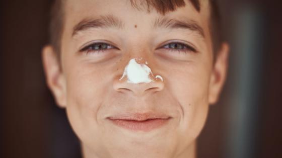 Camper with sunscreen on nose