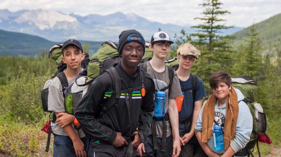 boys hiking in mountains