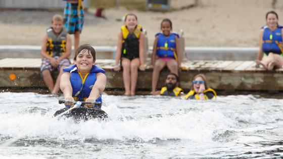 camper kneeboarding