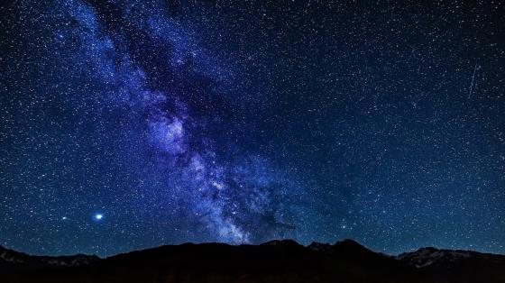 Stars at night over mountains