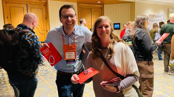 handing out bracelets at National Conference