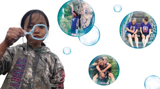 Camper blowing bubbles with images of other campers in bubbles