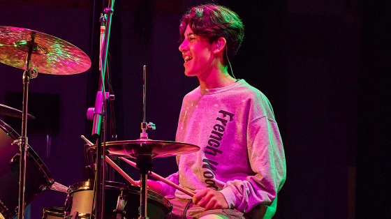 camper on drums