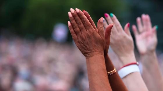 Black and white hands together