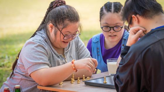 people playing board game