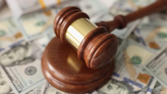 Gavel on dollar bills