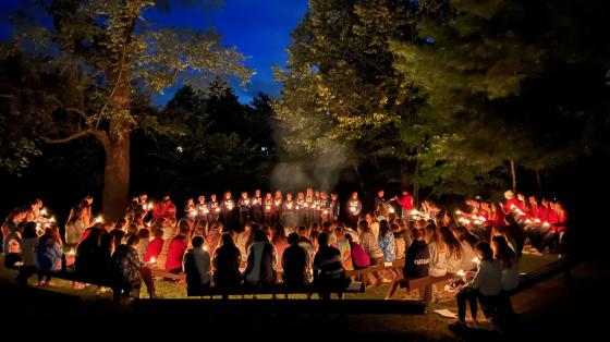 people around a campfire