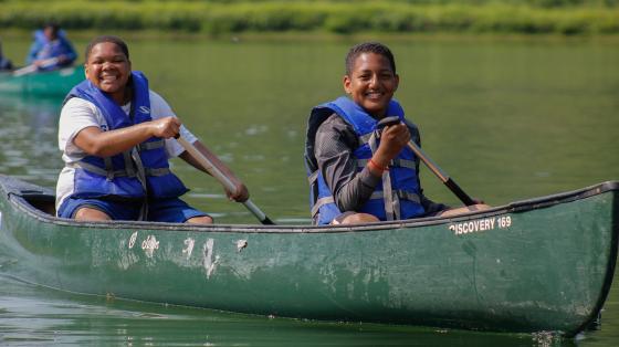 campers in canoe