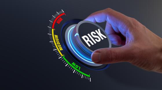 Dial that reads risk with a meter of low to high
