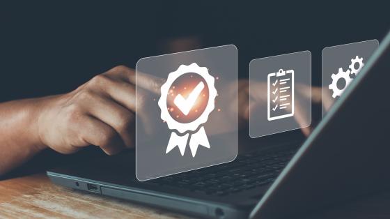 photo of laptop with checkmark/badge illustration