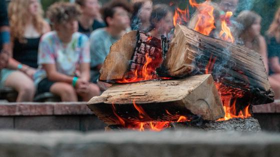 campers around fire
