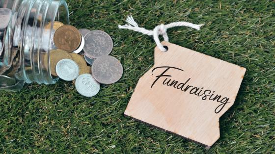 Jar of change with tag that reads fundraising
