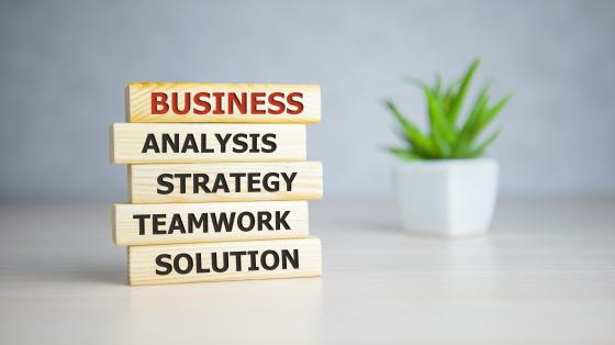 blocks that read business analysis strategy teamwork and solution