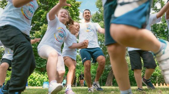 Campers and staff having fun in outdoor activity