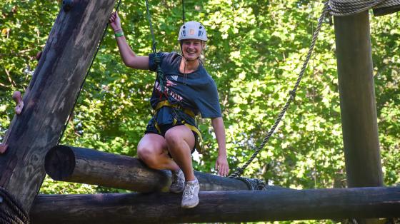 Teen camper on a ropes course