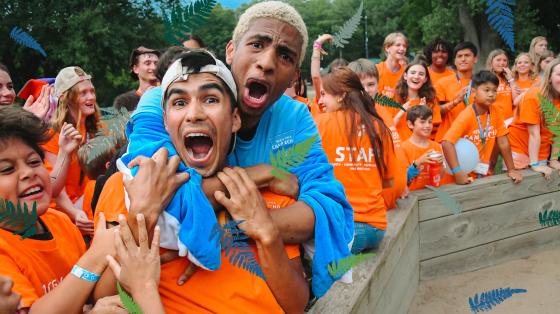 Campers and Counselors excited around gaga pit