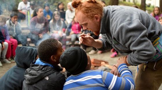 Staff talking to campers