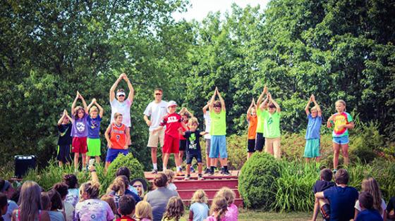 campers performing in front of entire camp